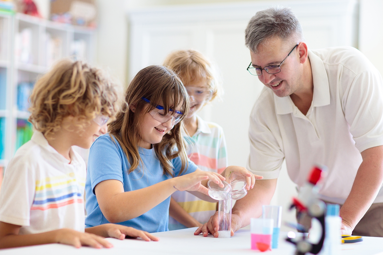 Neurodivergent children learning together in a classroom setting.